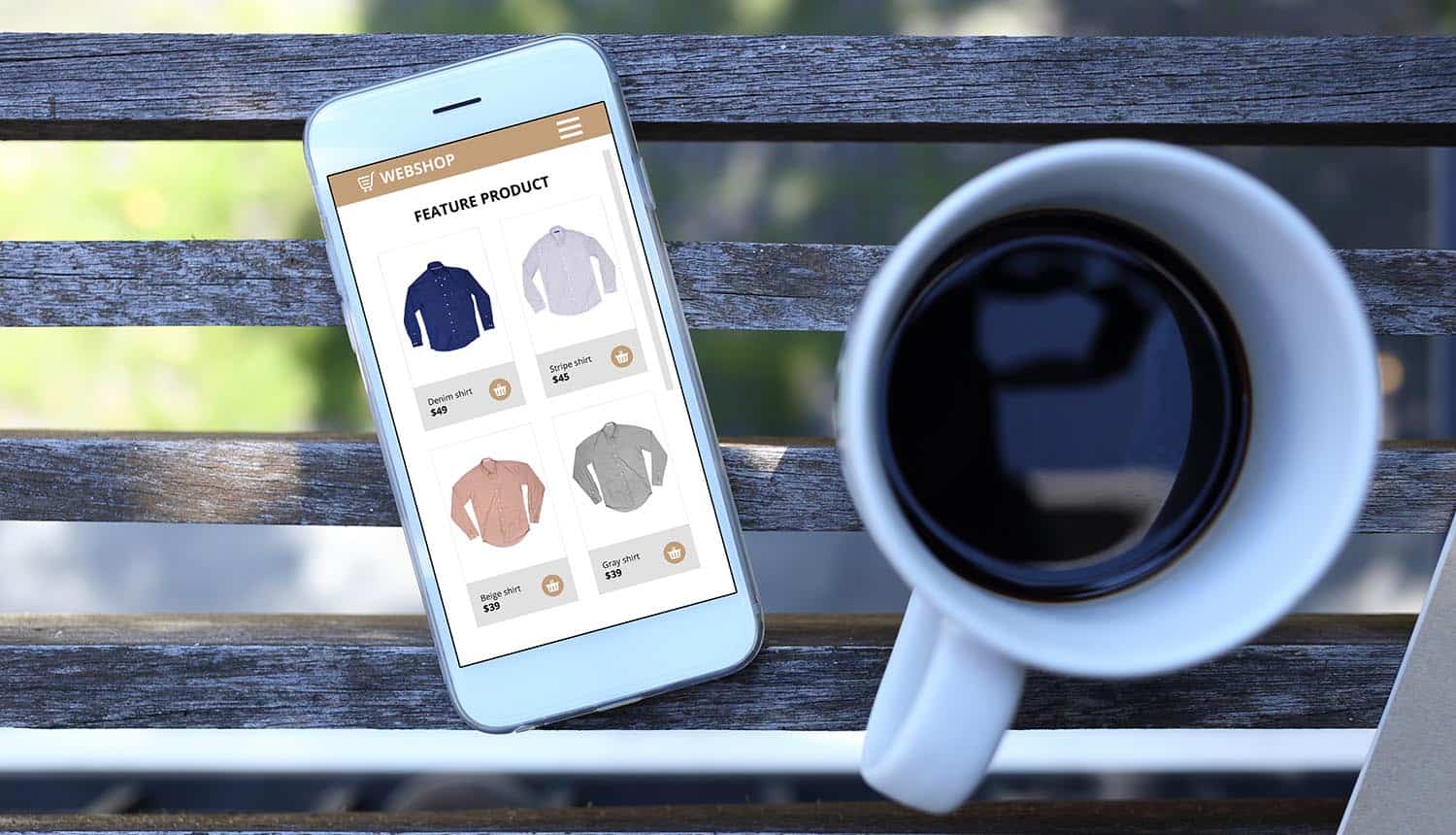 Image of mobile phone with shopping screen and coffee cup representing privacy in mobile advertising