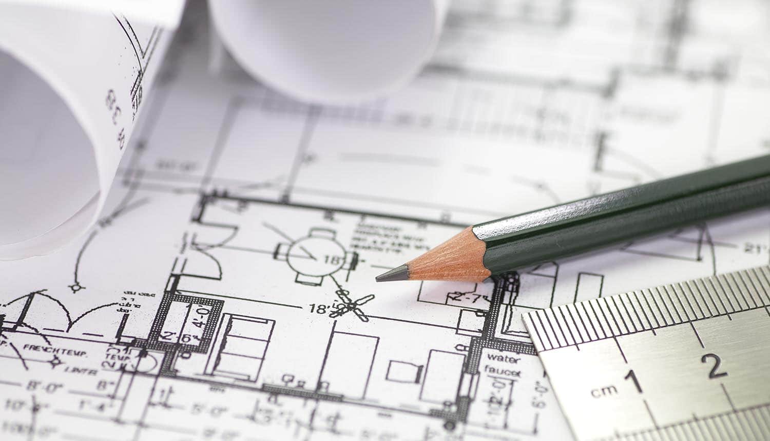 Image of pencil and ruler on a architect plan drawing representing how international standards can be used for privacy and security