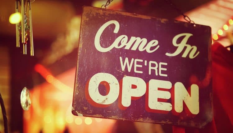 Image of open sign on window representing how the dark web selling remote access to corporate PCs