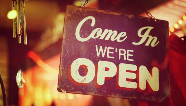 Image of open sign on window representing how the dark web selling remote access to corporate PCs