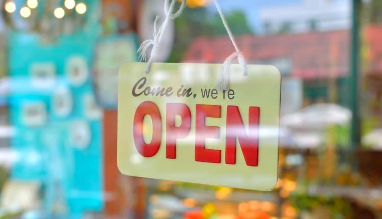 Image of a open sign on shop window representing how the end of net neutrality and the open internet will impact data privacy and cyber security