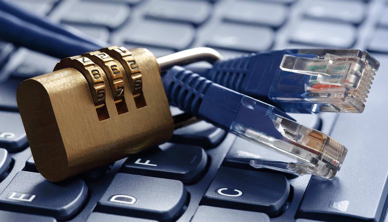 Image of lock on network cables on top of keyboard showing need for network security