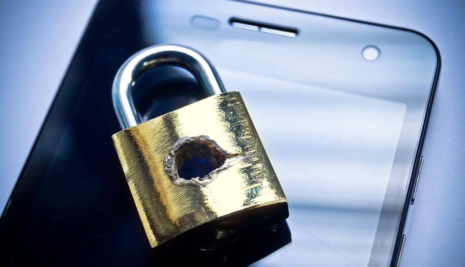 Image of lock with bullet hole on a cell phone