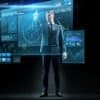 Businessman in suit touching virtual screen, performing data mining and analysis
