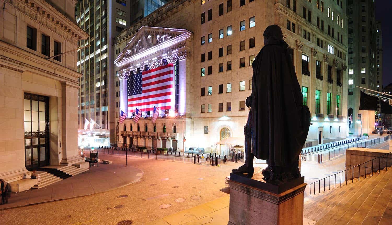 Intersection of Broad Street and Wall Street showing the George Washington Statue overlooking the New York Stock Exchange