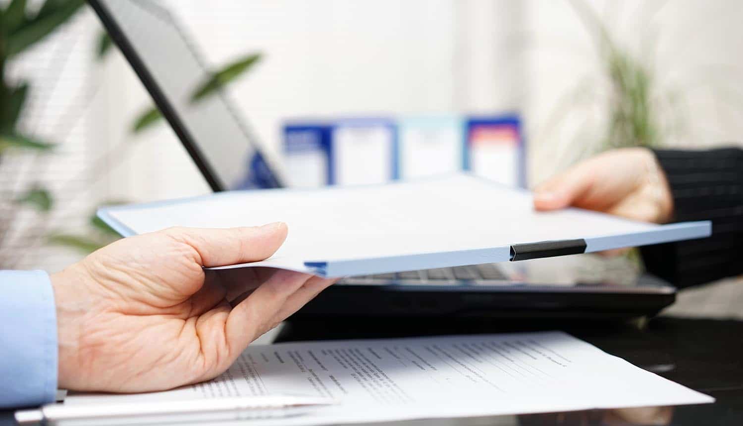 Businessman submitting report on GDPR compliance to the regulator