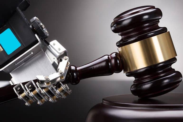 Robot's Hand Striking Gavel on Sounding Block Showing Tech Industry Push for a Federal Privacy Law