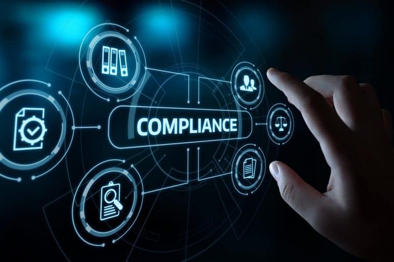 Hand reaching out to corporate compliance dashboard showing the future of data privacy post GDPR