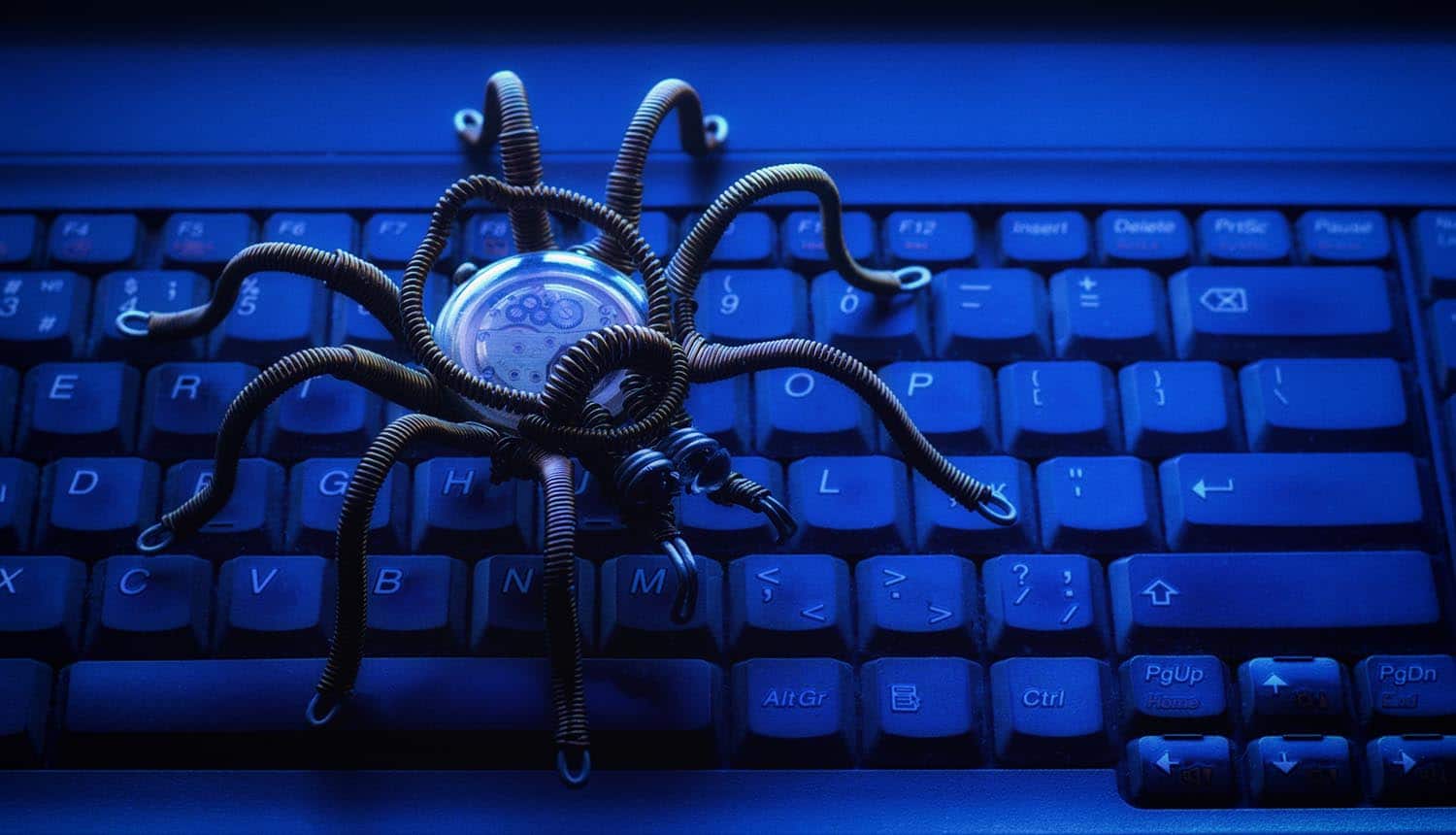 Spider on the computer keyboard showing how the WannaCry ransomware is still a threat after massive outbreak