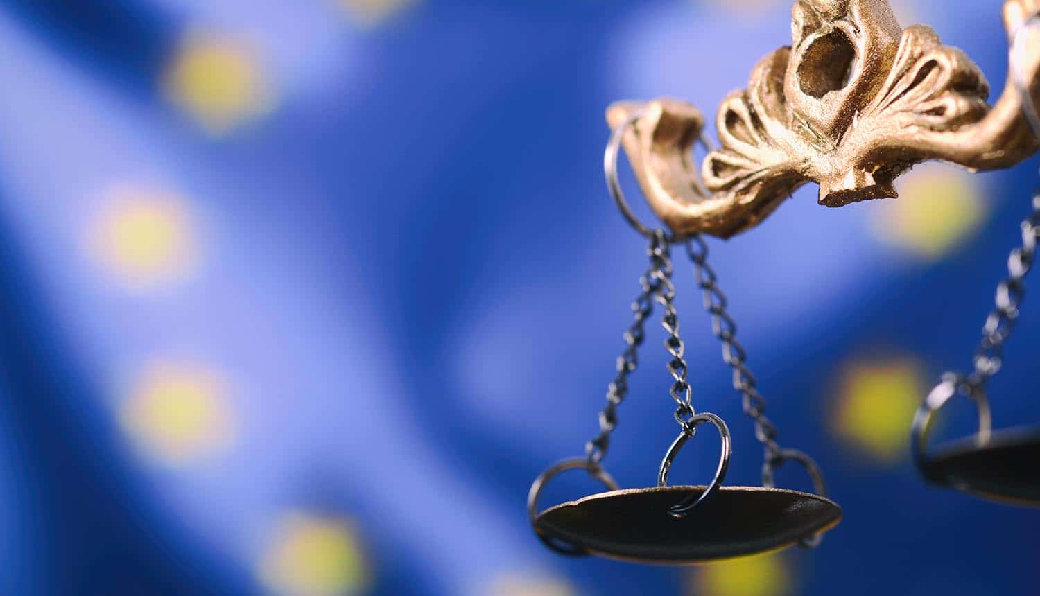 Justitia, Lady Justice in front of the European Union flag in the background showing the impact of Europe's new cookie regulations