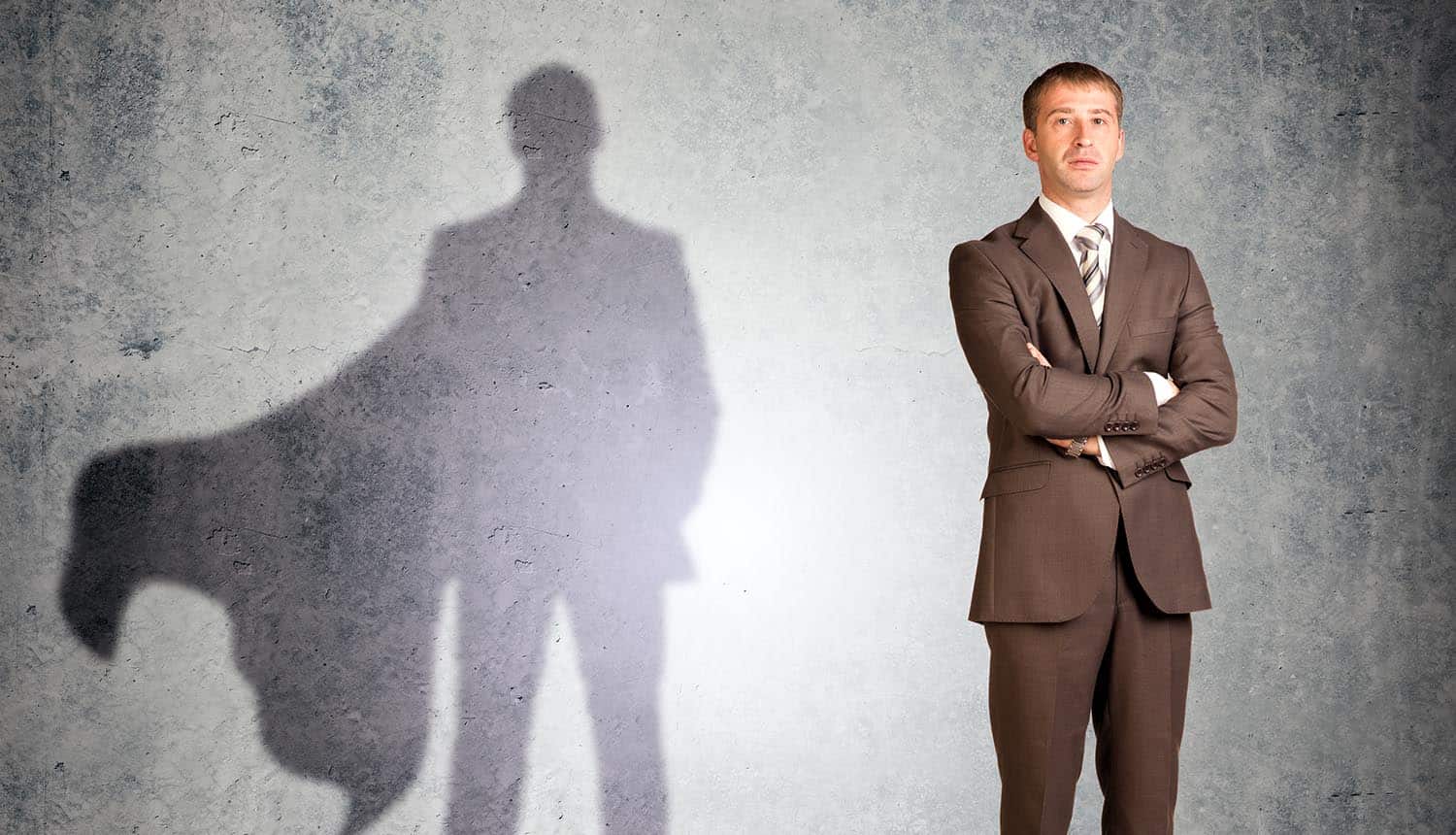 GDPR data protection officer (DPO) with superman shadow looking at camera