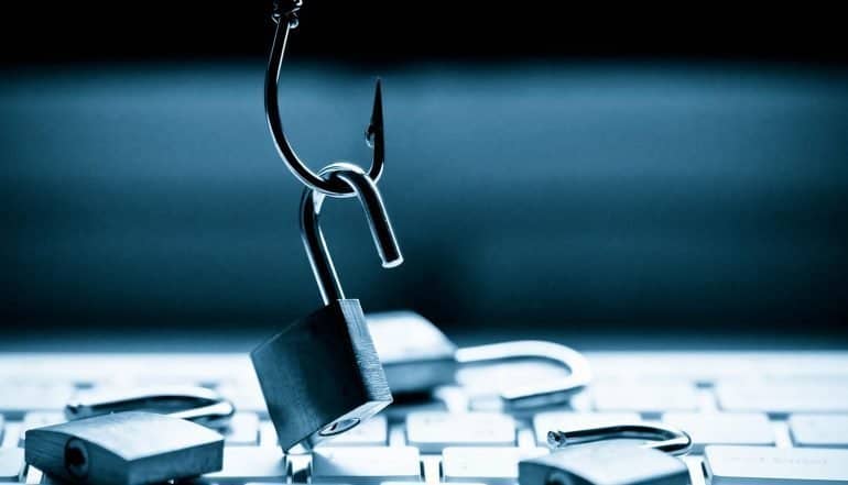 Hook picking up a lock showing phishing scams on computer system