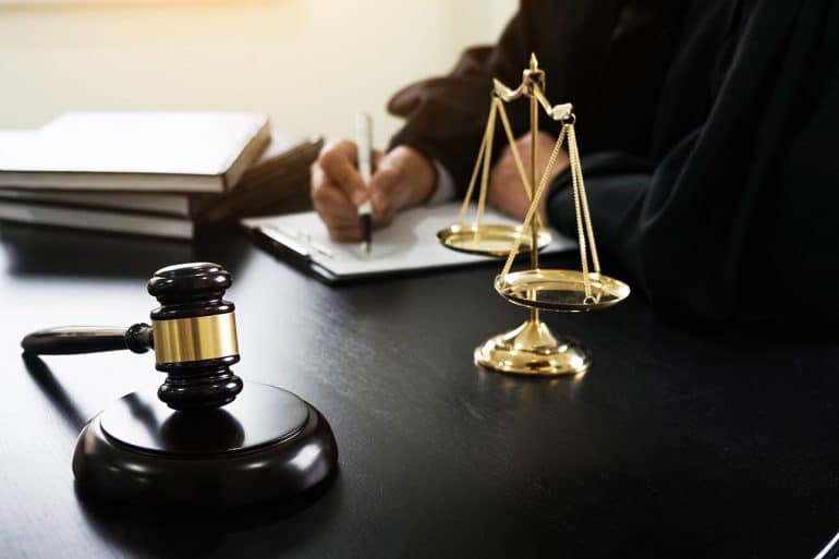 Lawyer working on document for analysis of proposed Data Care Act