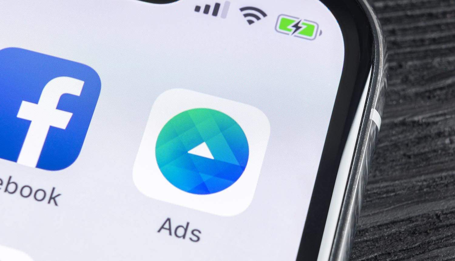 Facebook Ads application icon on iPhone showing privacy scandals have not slowed down social media giant