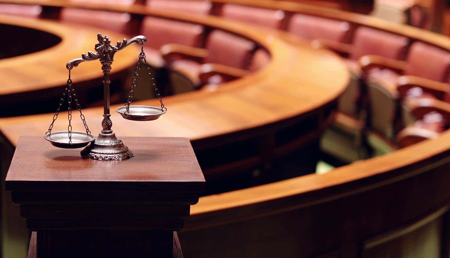 Symbol of law and justice in the empty courtroom showing proposed data privacy act for Washington state