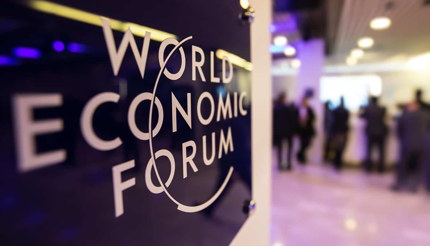 Emblem of the World Economic Forum in Davos showing increased calls for tech regulation and data governance