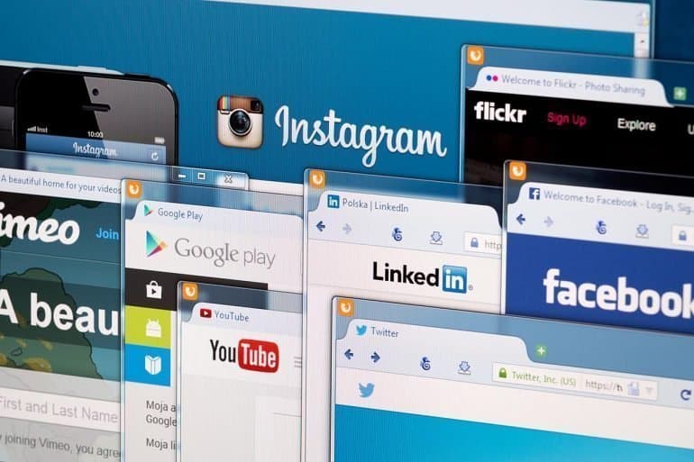 Photo of social network homepage on a monitor screen showing big tech and their agenda for privacy regulations