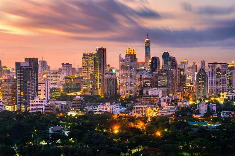 Bangkok city skyline downtown and clouds at sunset showing impact of new Thailand cybersecurity law