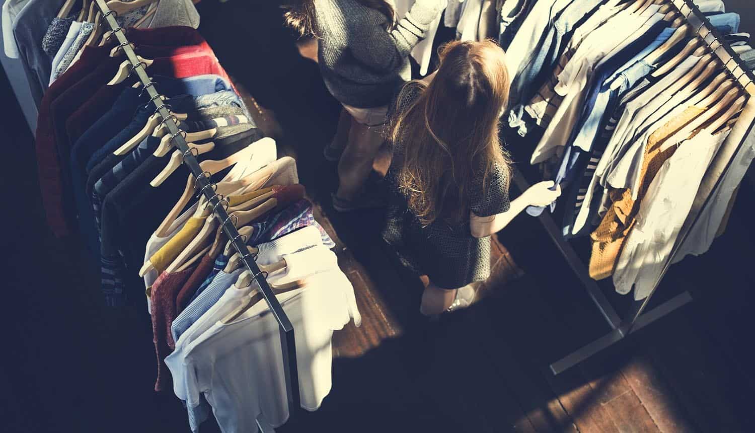 People shopping in a clothing store showing how small businesses are now a target for data breach