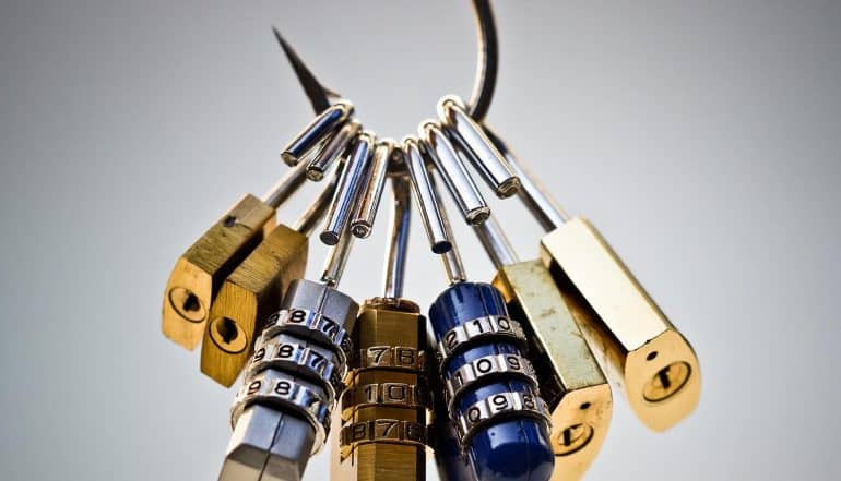A fish hook with security locks representing phishing attacks