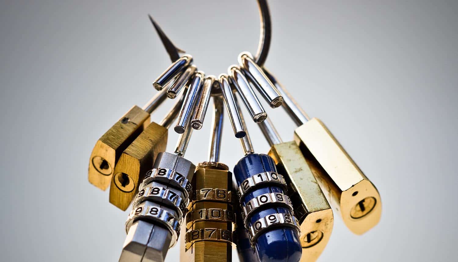 A fish hook with security locks representing phishing attacks