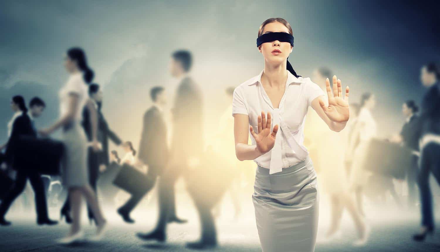 Woman in blindfold walking among group of people showing how Americans are lost when dealing with data breaches