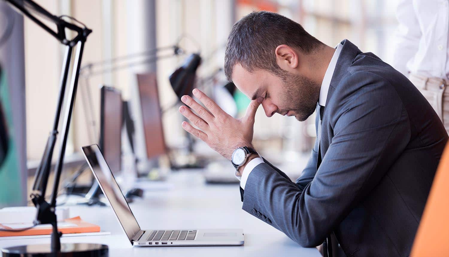 Frustrated young business man showing need to know how to comply with CCPA