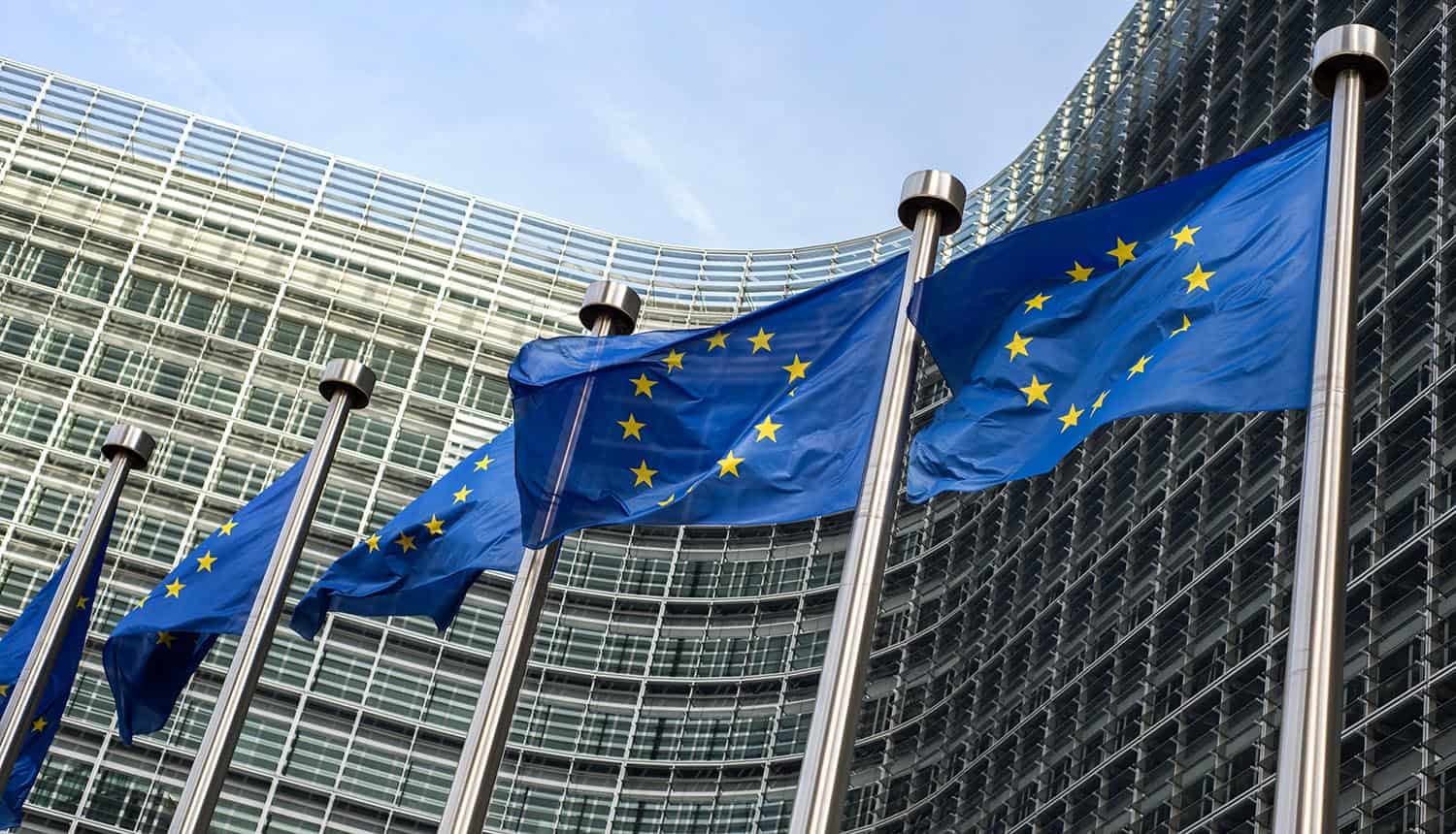 European Union flags in front of European Commission building showing requirement for organizations to appoint a Nominated European Representative under certain conditions in GDPR Article 27