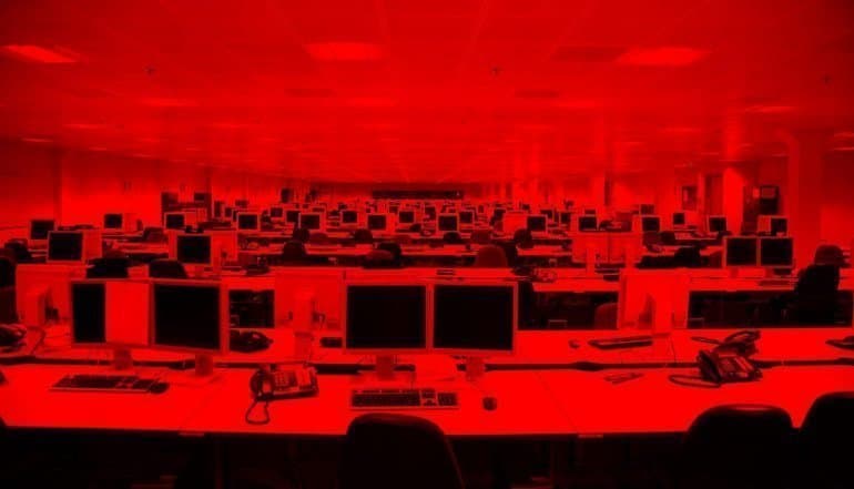 Computers in IT service provider office showing vulnerability for supply chain attacks