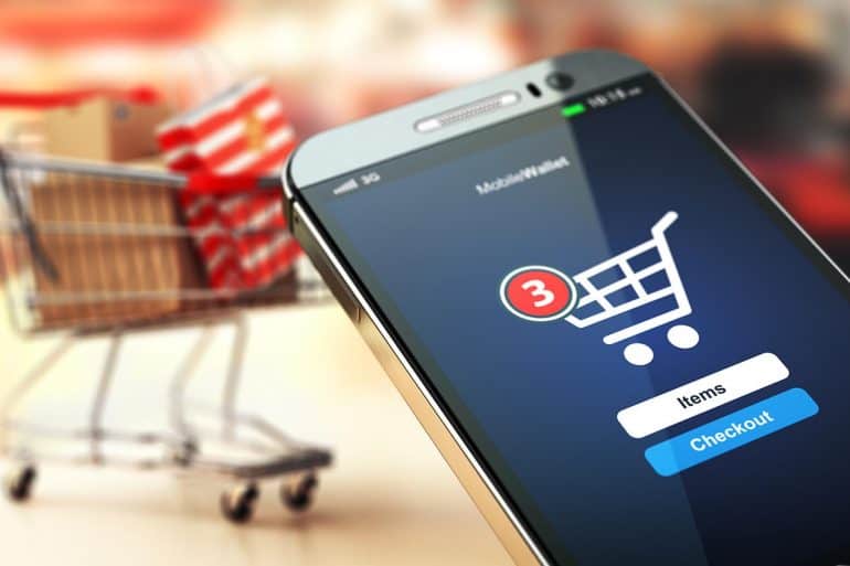 Online shopping using mobile phone showing use of digital payment methods
