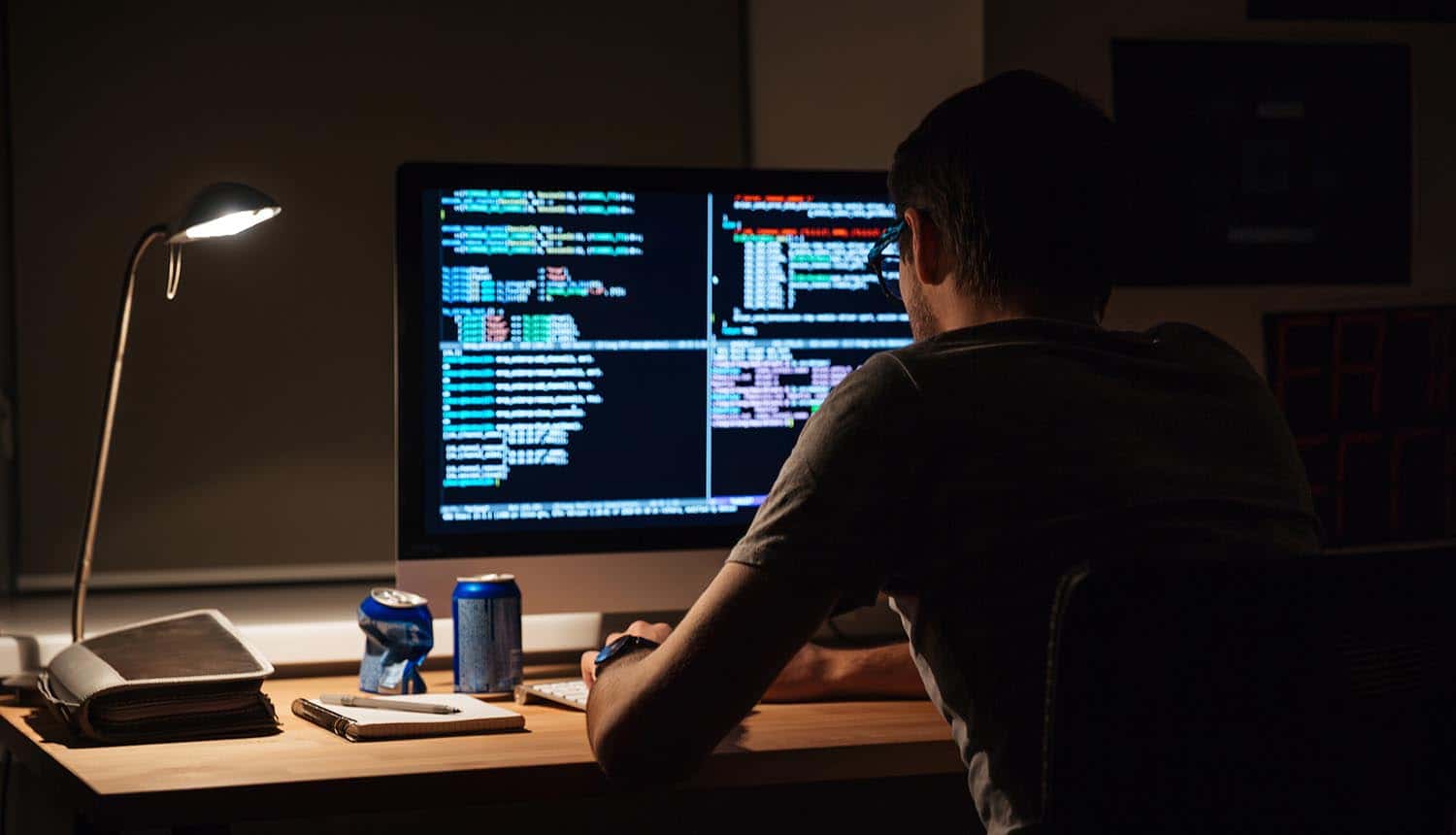 Programmer writing software code showing the importance of GDPR compliance in software development