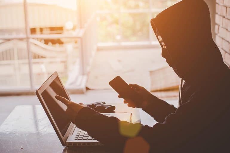 Hacker working on computer showing Chinese spies using NSA cyber weapons long before Shadow Brokers hacker group released them