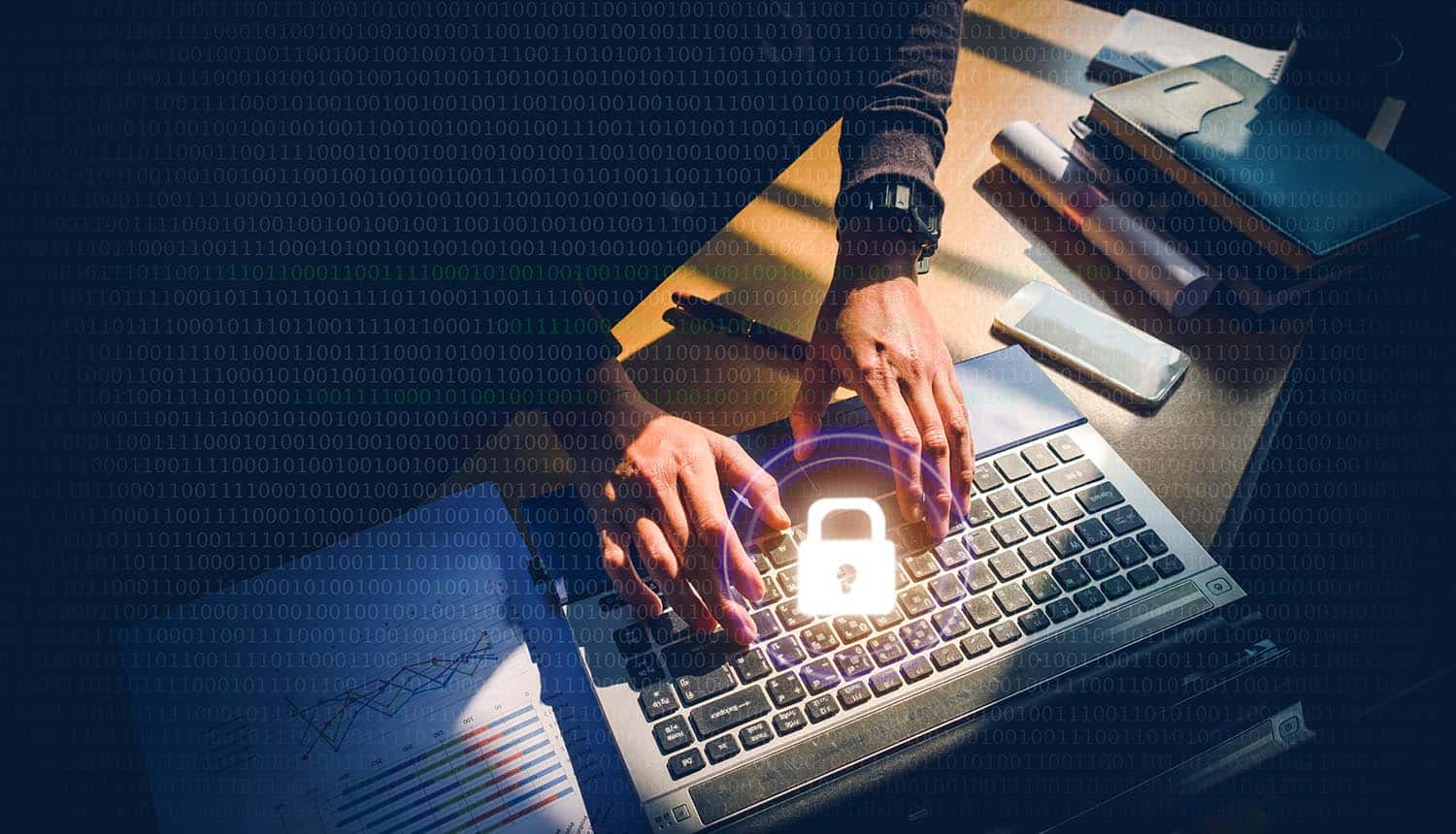 Padlock against hands on keyboard showing tips for businesses to prevent data breach