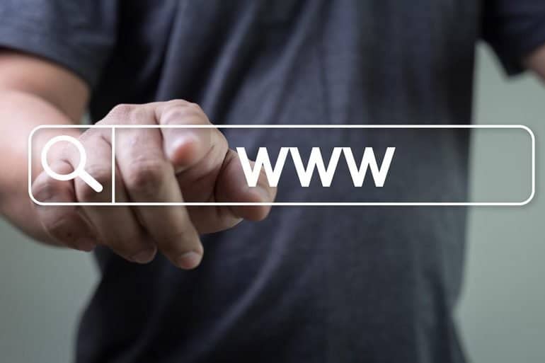 Man pointing at www symbol showing the key things to look for on a website for security