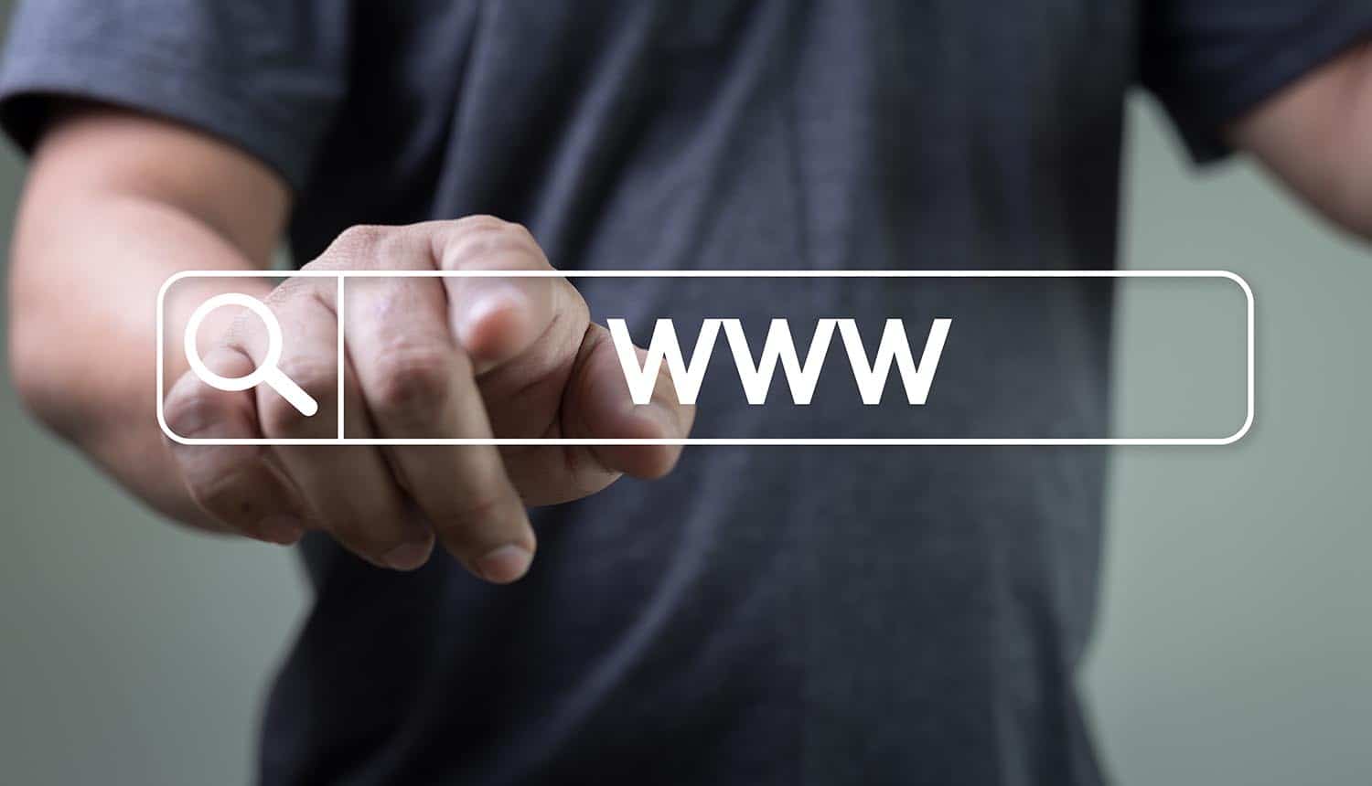 Man pointing at www symbol showing the key things to look for on a website for security