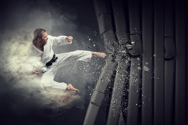 Karate man breaks wall showing Israel's cyber response using missile strike