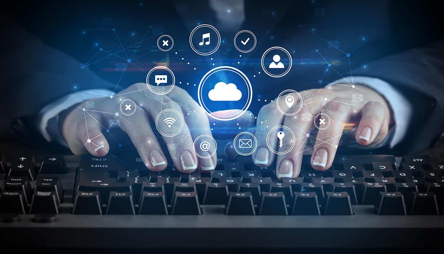 Woman typing on keyboard with application icons around showing Chinese Cloud Hopper operation which targets tech providers for access to their customers’ intellectual property