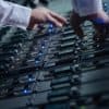 Engineer working on storage system in data center showing Microsoft deletion of its facial recognition database