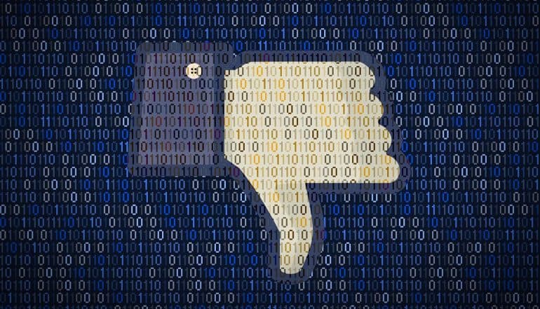 Facebook thumb down logo against binary code showing different responses and views over record-setting $5 billion Facebook fine