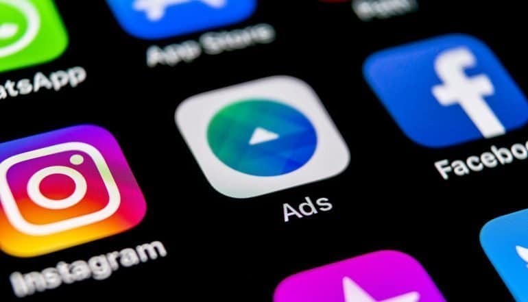 Advertisement icon on mobile phone showing how the data protection case over programmatic advertising tackles the foundation of Internet