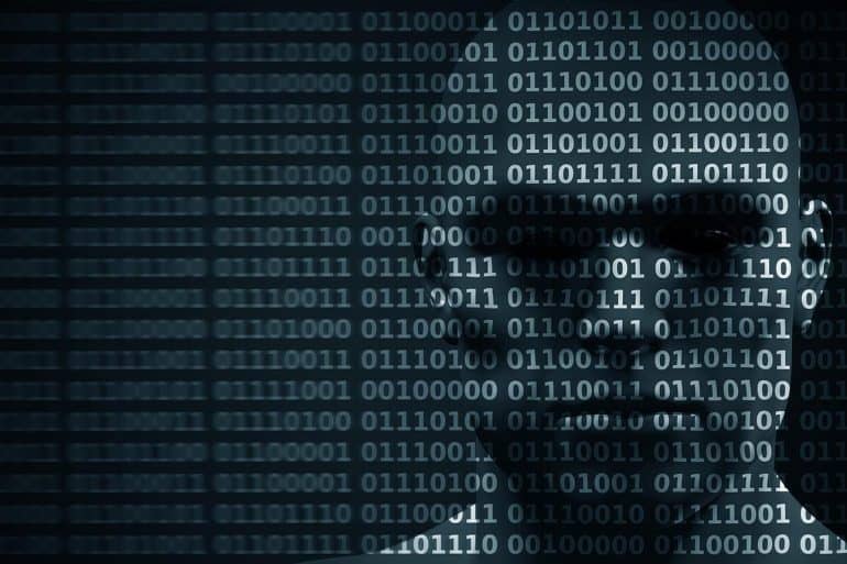 Man face blended with binary code digits showing major international companies being attacked by Winnti malware