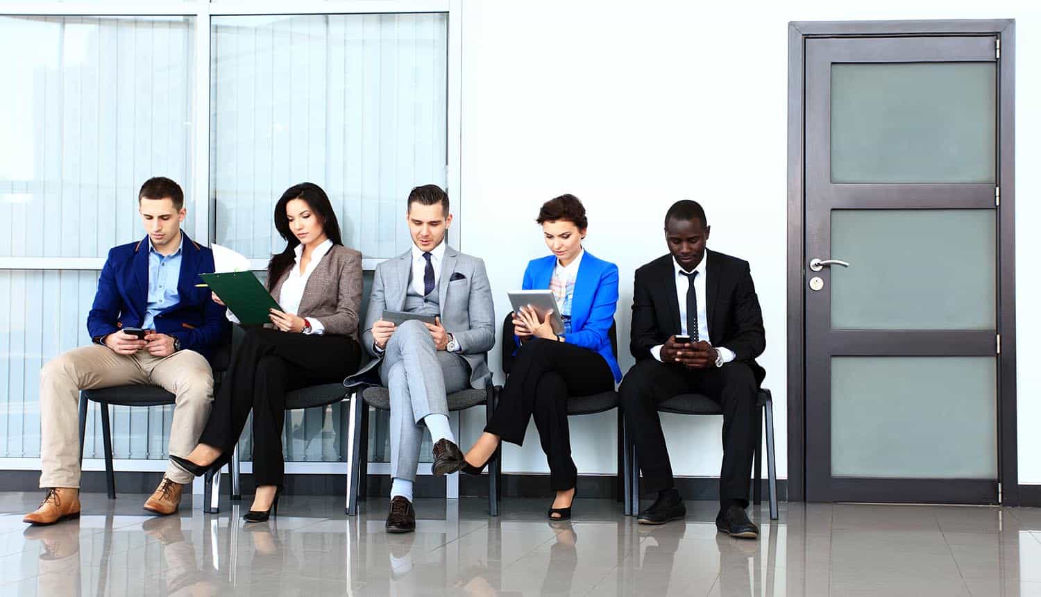 People waiting for job interview showing the debate over how much responsibility Monster.com should take for recent third party data breach