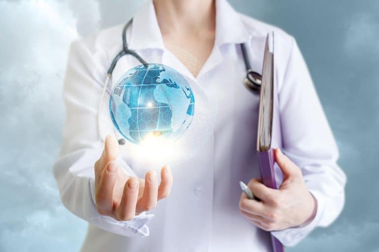 Doctor holding health data files in one hadn and globe in the other showing concerns with Google's Project Nightingale