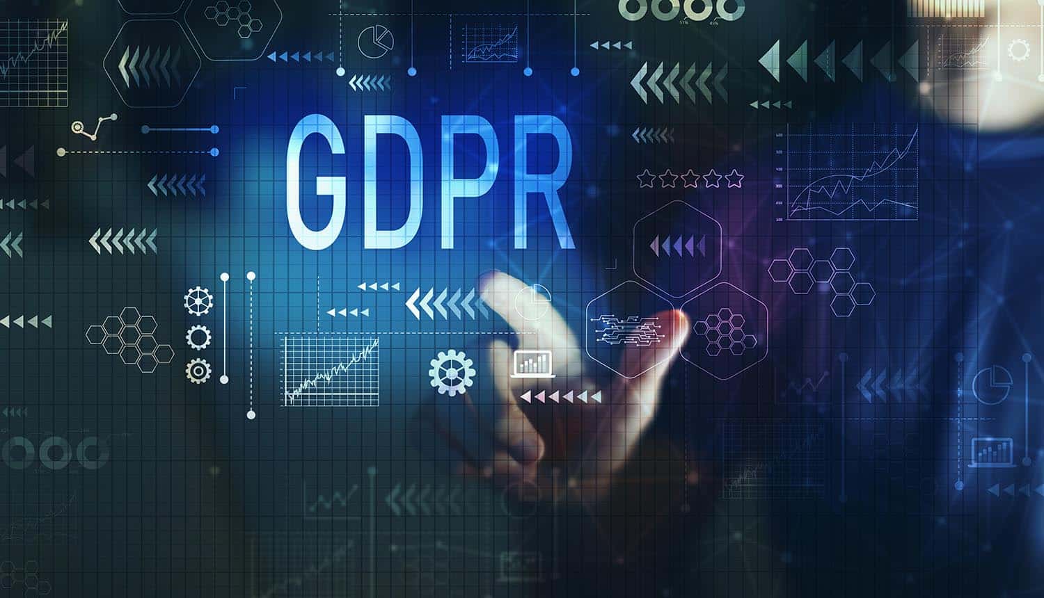 Man touching GDPR word on virtual screen showing the costs and benefits that GDPR and CCPA compliance can bring to companies