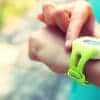 Kid looking at smart watch showing the location tracking cloud vulnerability which impacts millions of smartwatches worn by children