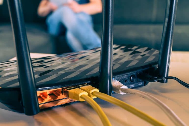 Closeup of a wireless router showing WiFi security flaw that can impact 1 billion devices