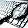 Magnifying glass on laptop keyboard showing the adversary attribution approach to fight cybercrime
