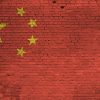 China flag painted on brick wall showing the expansion of privacy rights in China’s new civil code