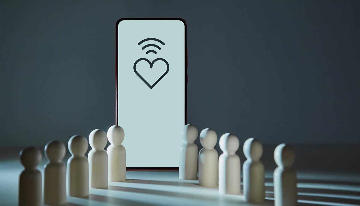 Heart, wifi on smartphone screen showing exposed data of niche dating apps