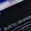 GitHub home page on laptop screen showing the malware attack on open source projects hosted on GitHub repositories